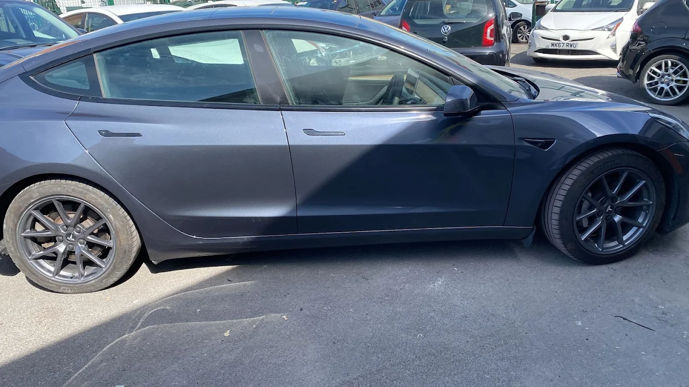 Finished grey Tesla after bodywork at PBS Autos